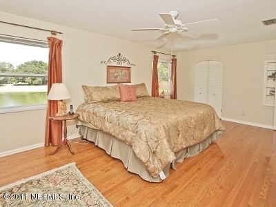 7540 Hollyridge Road Jacksonville, FL 32256 - Photo 16 of 31 Master Bedroom with lake view