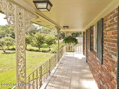 7540 Hollyridge Road Jacksonville, FL 32256 - Photo 26 of 31 Porch off bedrooms #3 & #4
