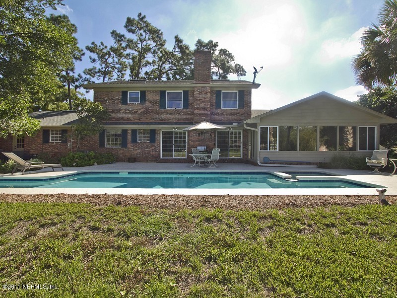 7540 Hollyridge Road Jacksonville, FL 32256 - Photo 30 of 31 Backyard - rear of home view from lake