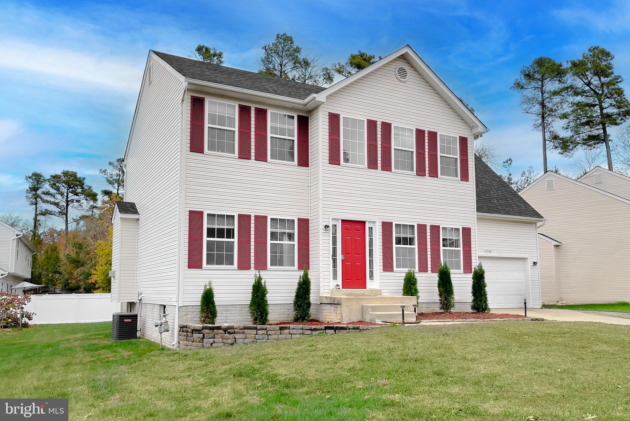 47162 Green Leaf Road Lexington Park, MD 20653 - Photo 1 of 50 a front view of house with yard