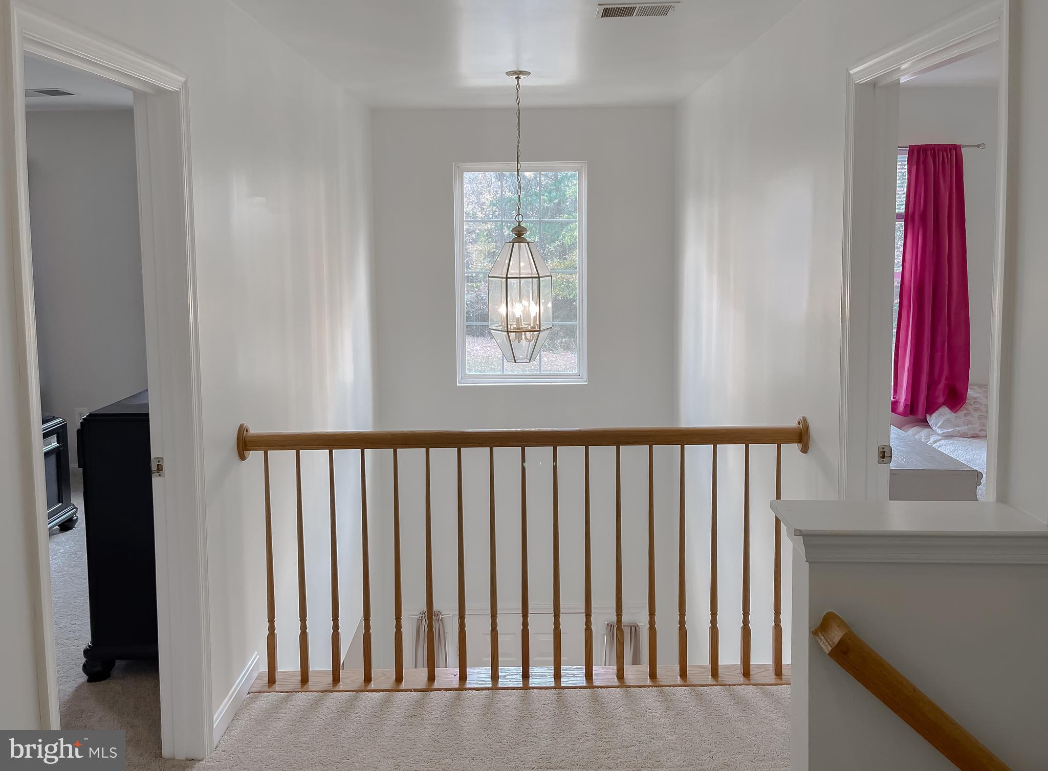 47162 Green Leaf Road Lexington Park, MD 20653 - Photo 24 of 50 a view of a bedroom with furniture and window