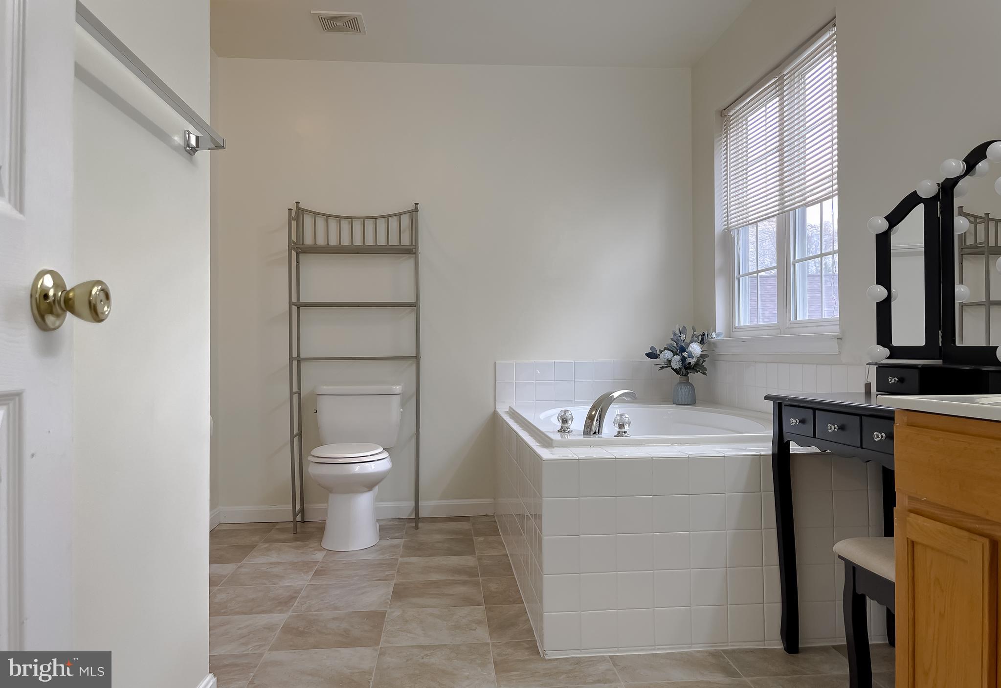 47162 Green Leaf Road Lexington Park, MD 20653 - Photo 30 of 50 a bathroom with a sink toilet and shower