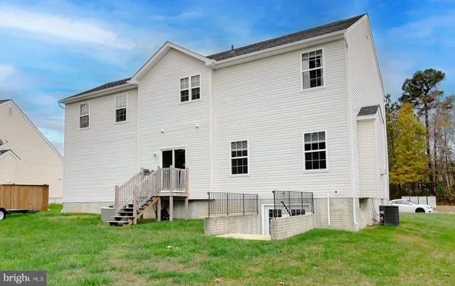 a front view of house with yard