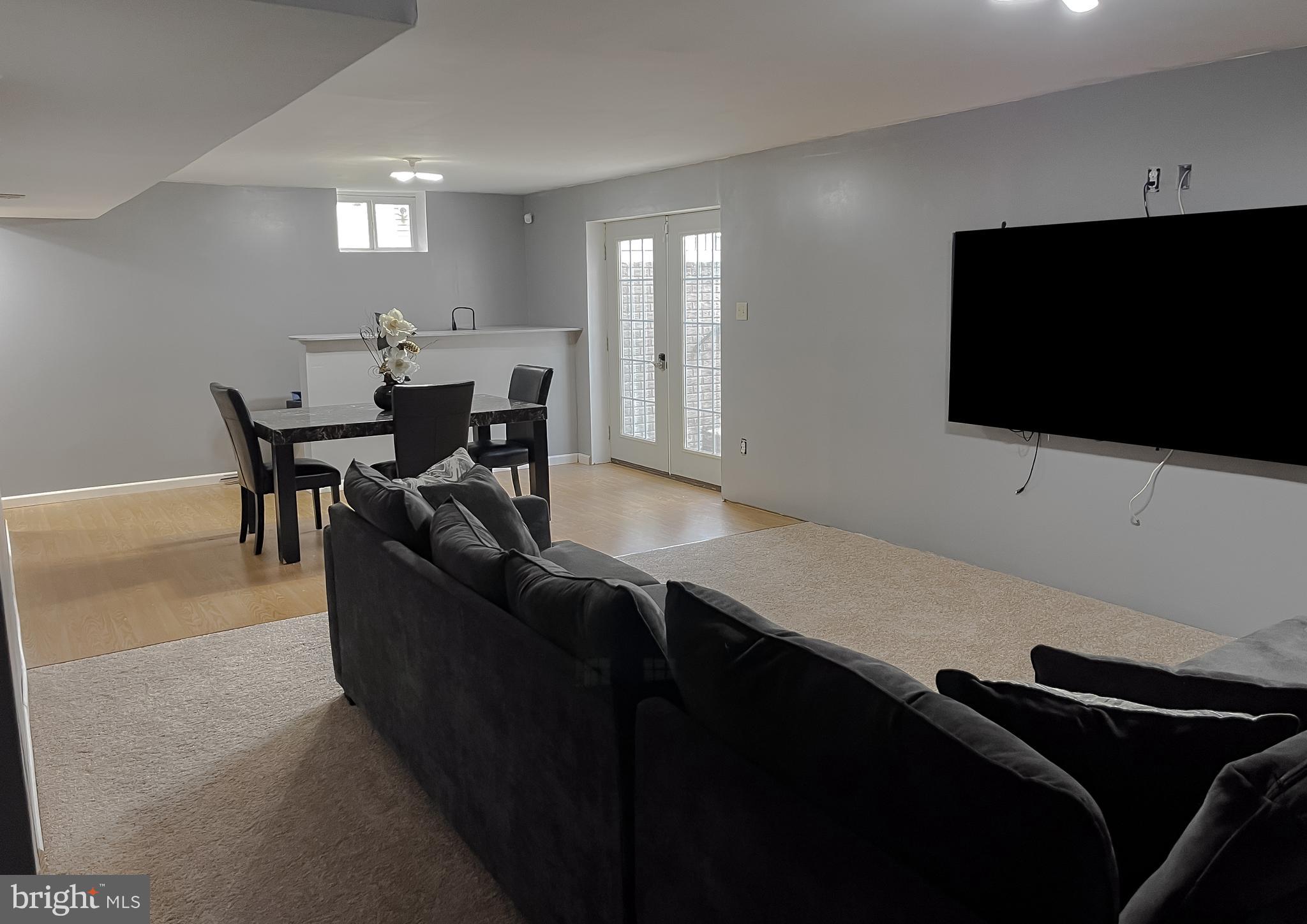 47162 Green Leaf Road Lexington Park, MD 20653 - Photo 50 of 50 a living room with furniture and a flat screen tv
