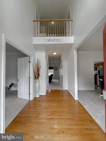 a view of a living room and a chandelier