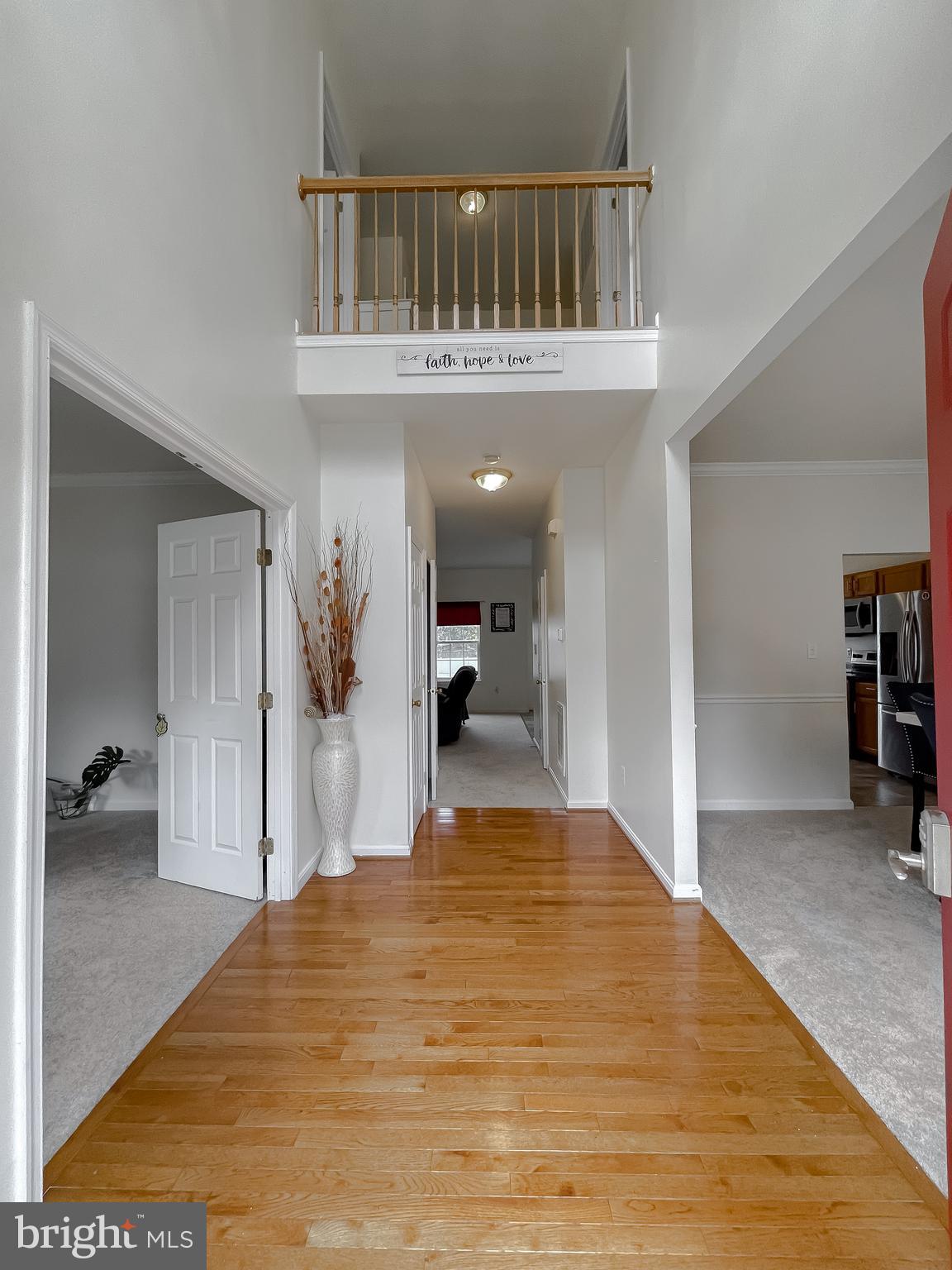 47162 Green Leaf Road Lexington Park, MD 20653 - Photo 5 of 50 a view of a living room and a chandelier