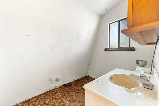a bathroom with a sink and a vanity