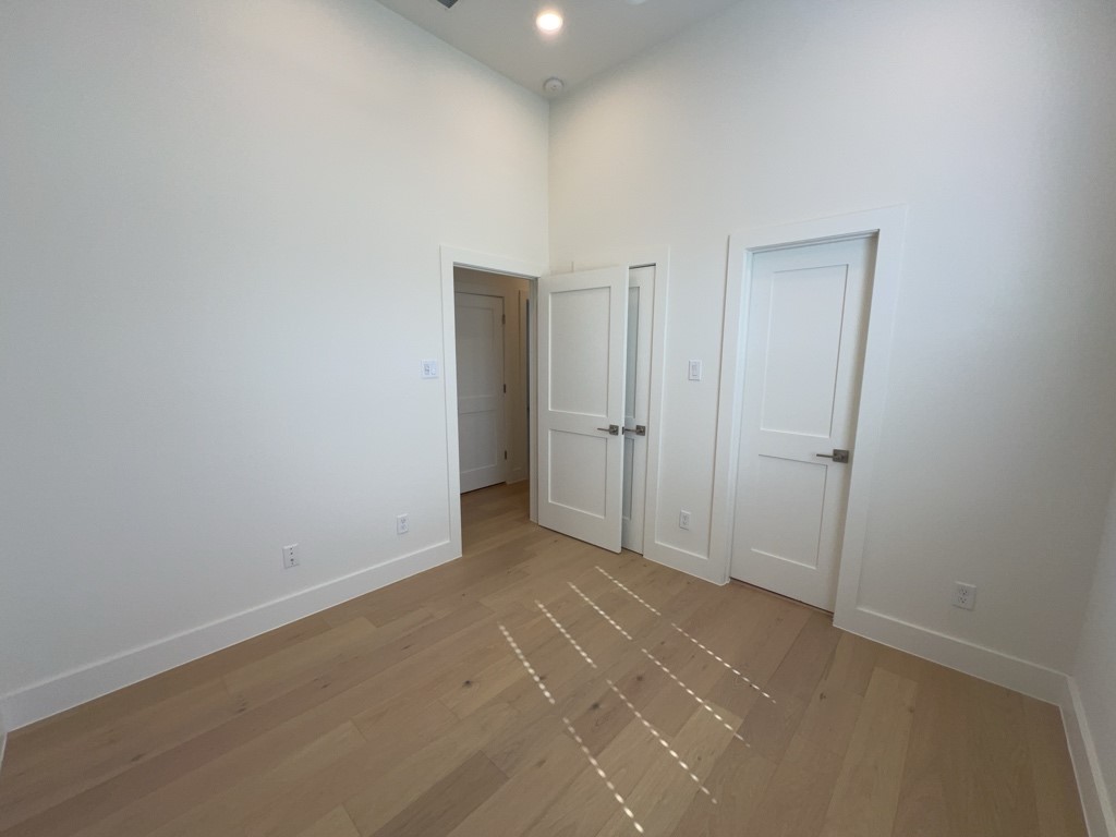 10607 Enclave Shadows Court Houston, TX 77043 - Photo 12 of 23 a view of room with window