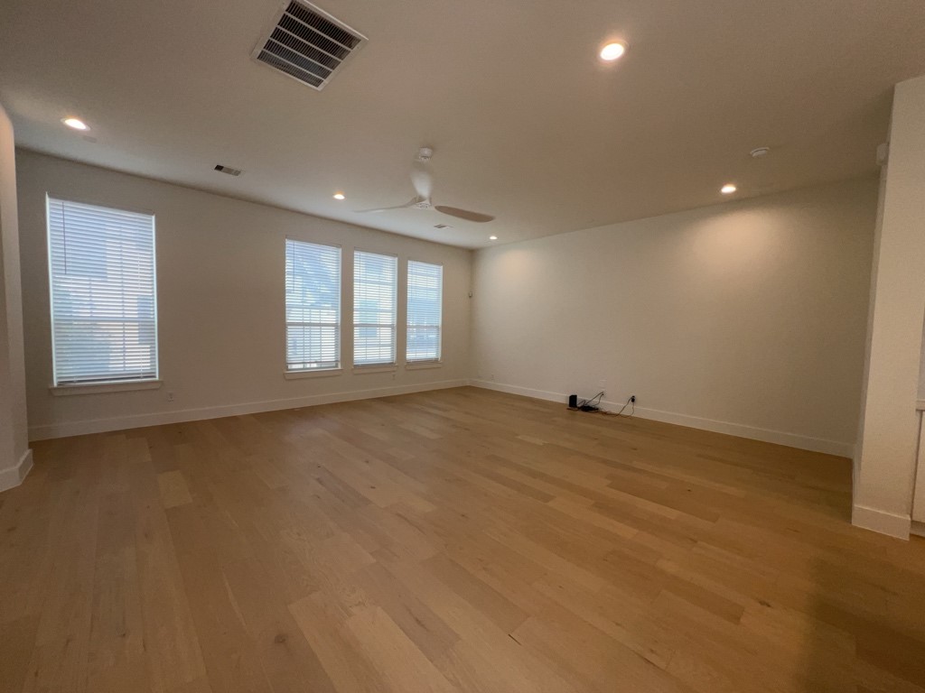 10607 Enclave Shadows Court Houston, TX 77043 - Photo 18 of 29 an empty room with windows
