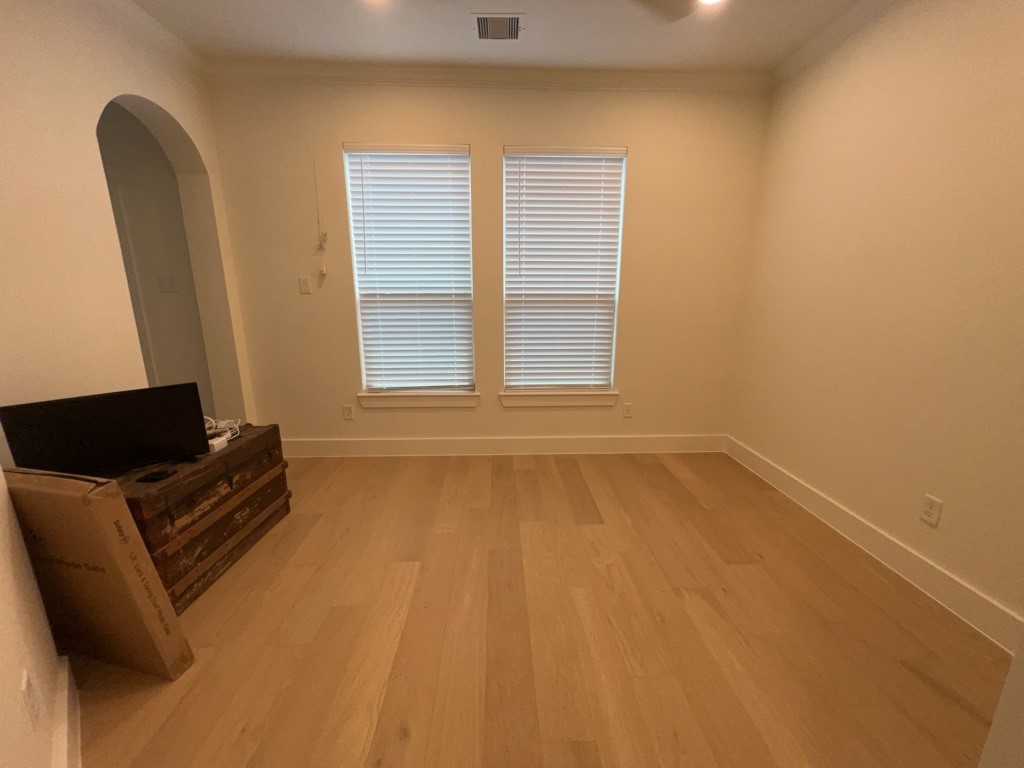10607 Enclave Shadows Court Houston, TX 77043 - Photo 22 of 29 a view of room with window and furniture