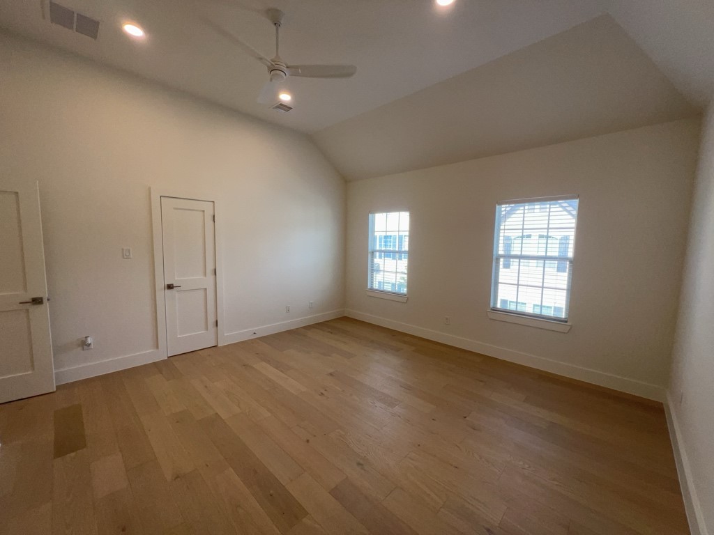 10607 Enclave Shadows Court Houston, TX 77043 - Photo 9 of 23 an empty room with windows and closet