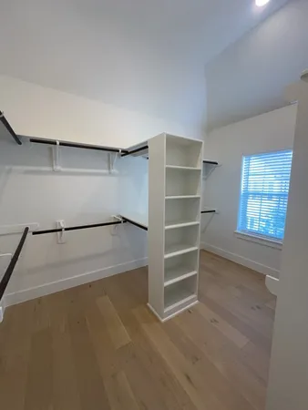 a view of an empty walk in closet
