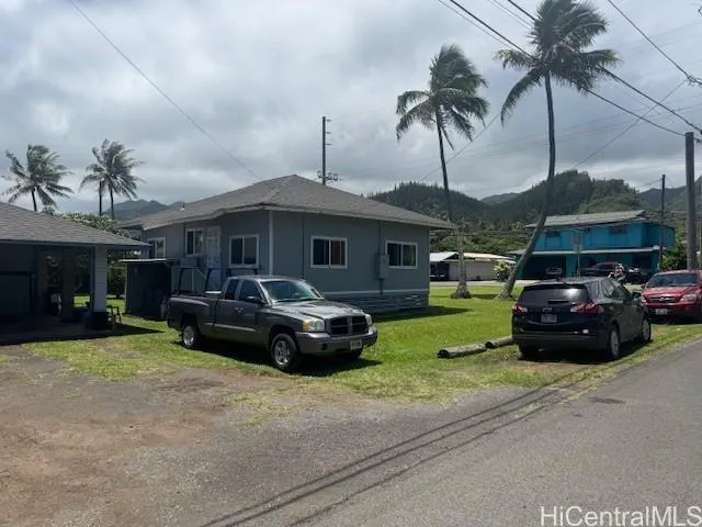 a car parked in front of a house