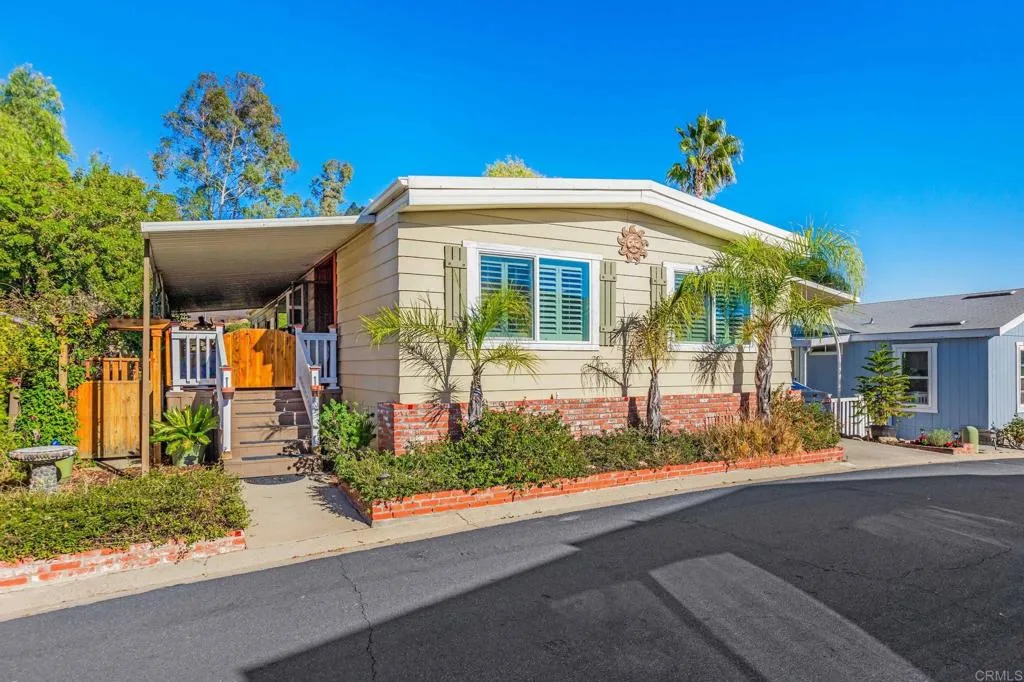 a front view of a house with a porch