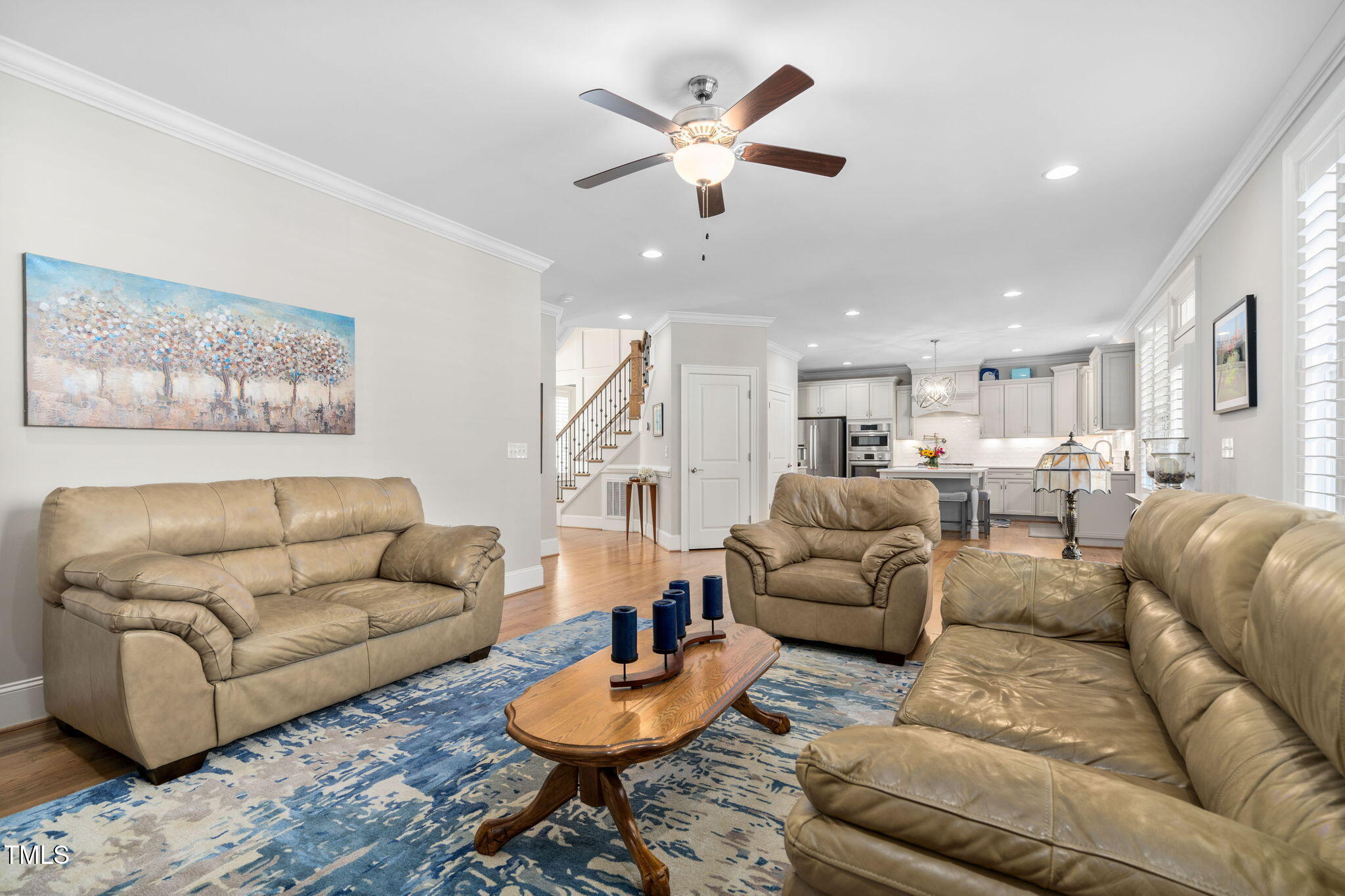 2461 Stonehenge Park Drive Raleigh, NC 27613 - Photo 17 of 72 a living room with furniture and kitchen view