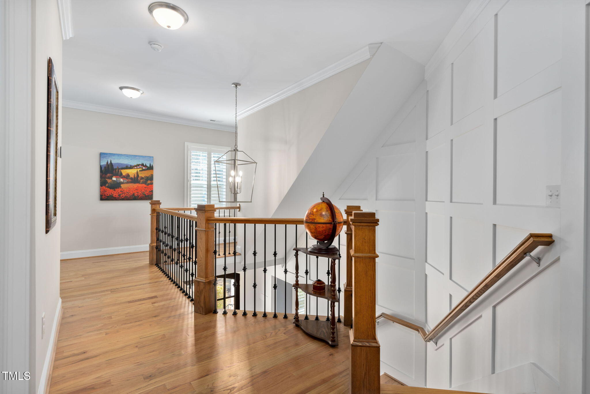 2461 Stonehenge Park Drive Raleigh, NC 27613 - Photo 22 of 72 a view of a hallway with wooden floor and windows