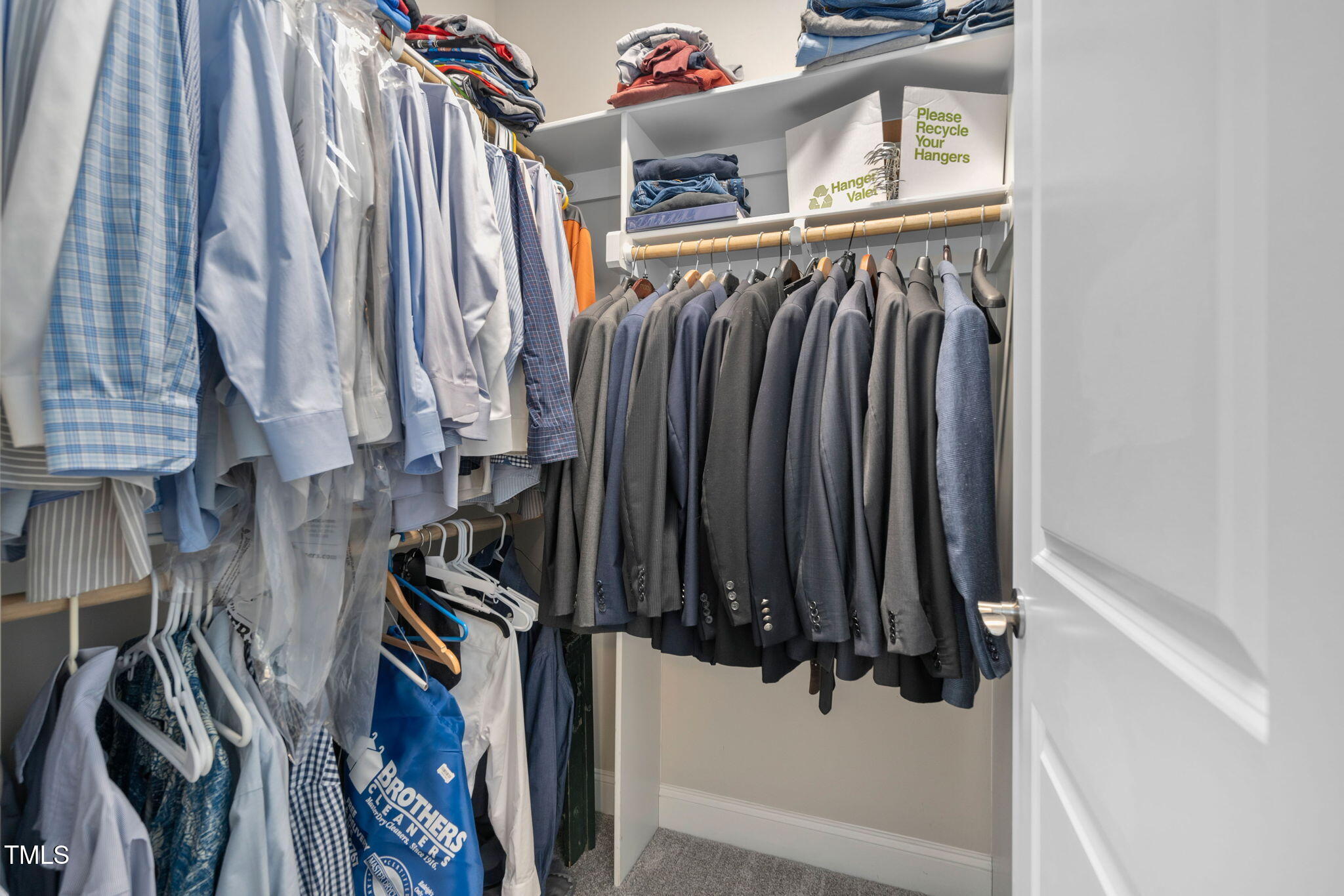 2461 Stonehenge Park Drive Raleigh, NC 27613 - Photo 30 of 72 a view of walk in closet with clothes and shoes
