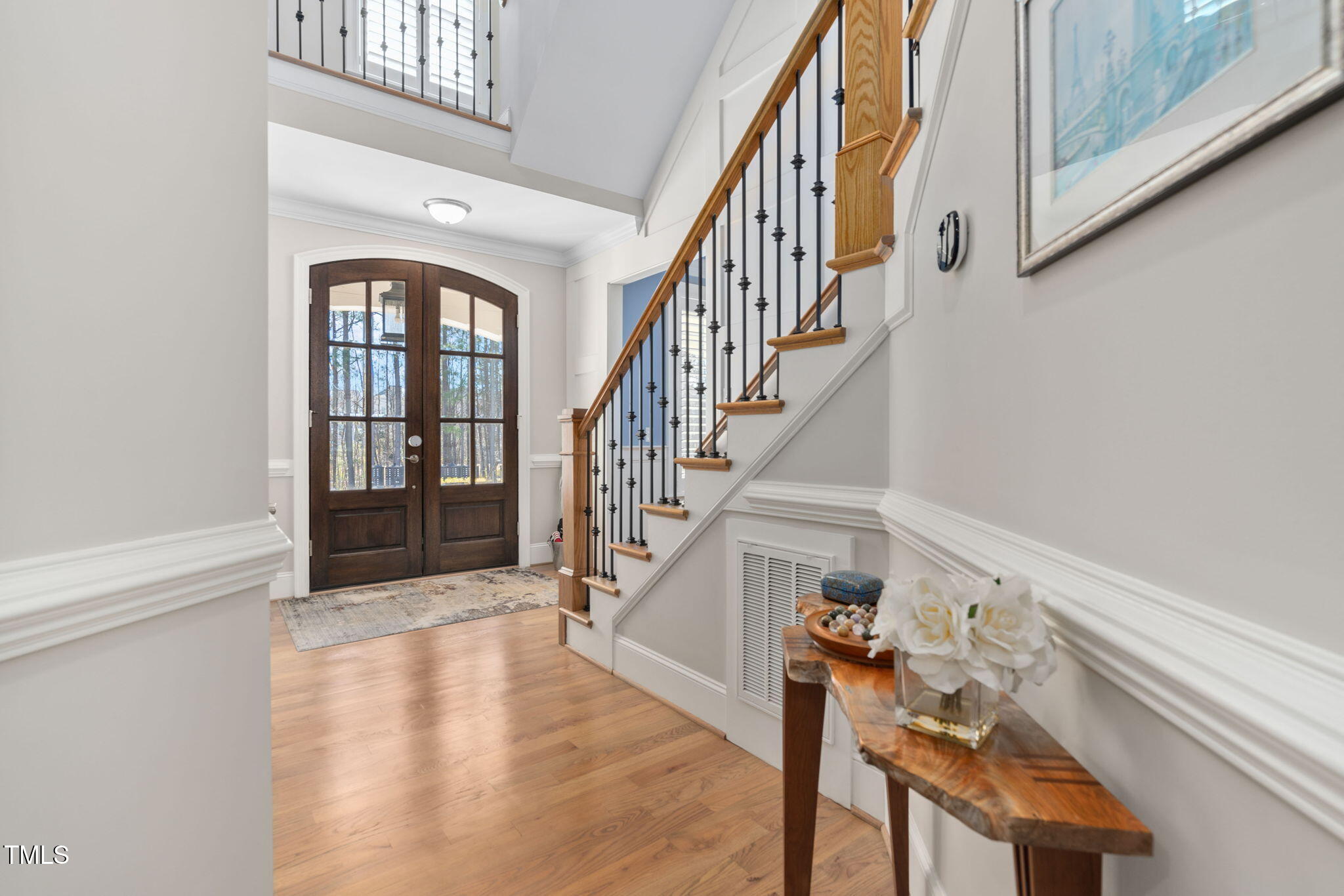 2461 Stonehenge Park Drive Raleigh, NC 27613 - Photo 4 of 72 a view of entryway and hall with wooden floor