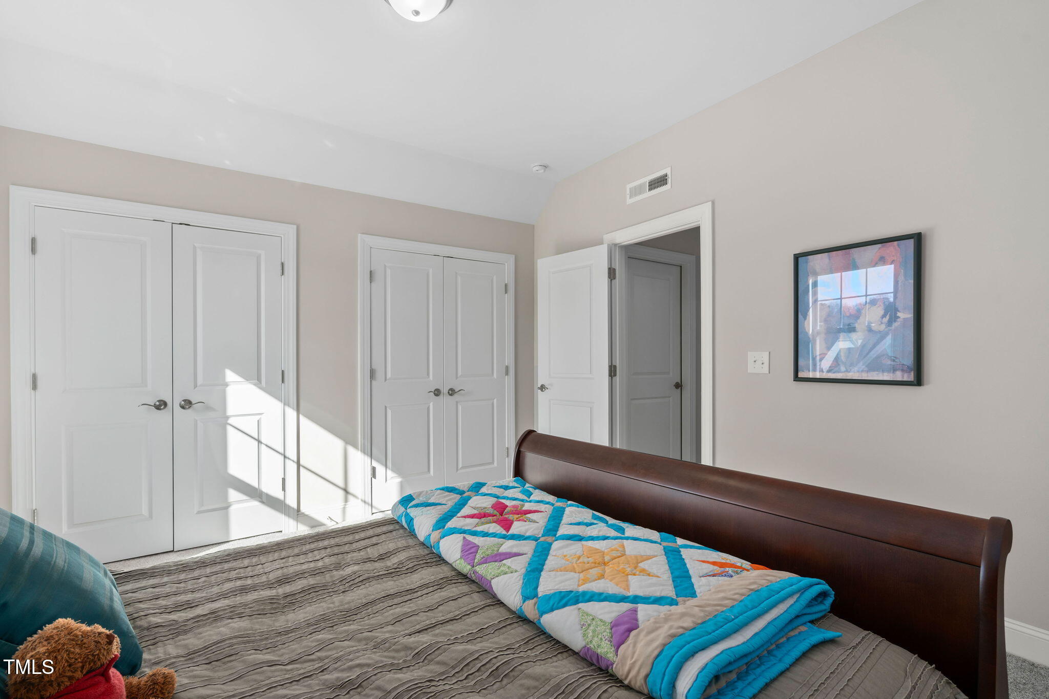 2461 Stonehenge Park Drive Raleigh, NC 27613 - Photo 42 of 72 a living room with furniture and wooden floor