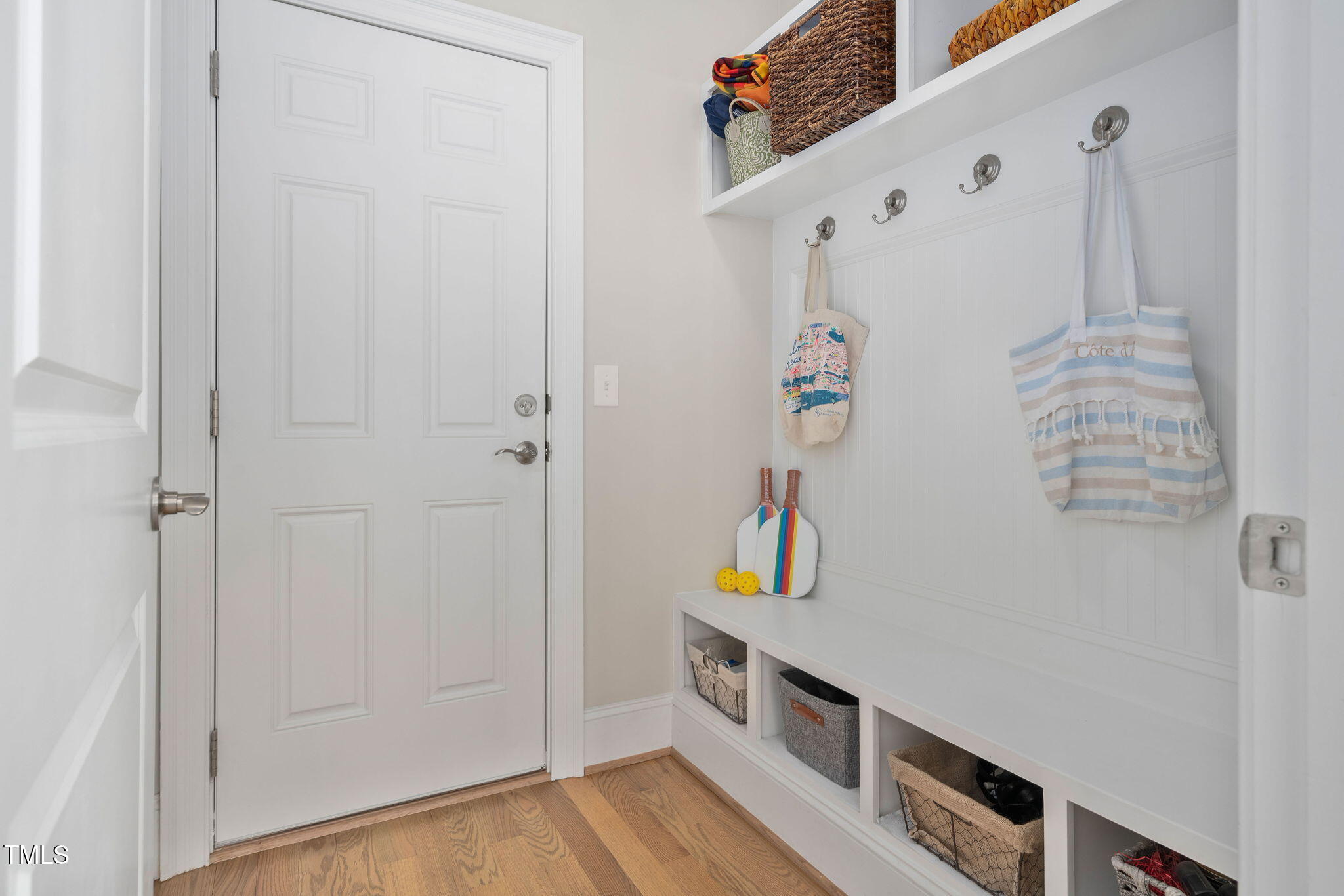 2461 Stonehenge Park Drive Raleigh, NC 27613 - Photo 46 of 72 a view of an entryway with wooden floor