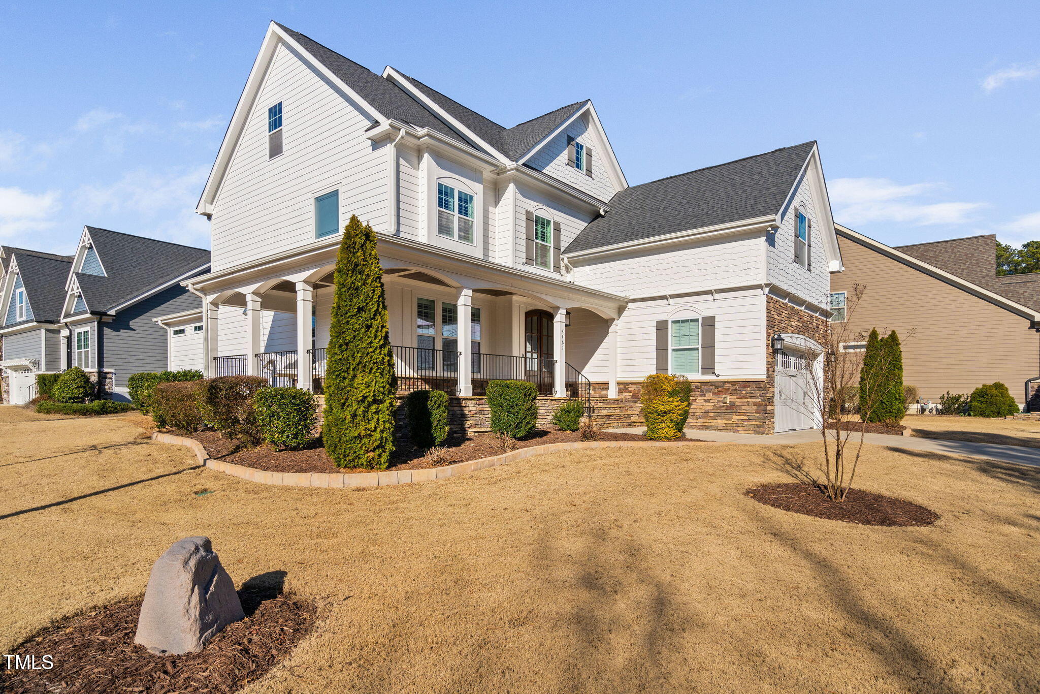 2461 Stonehenge Park Drive Raleigh, NC 27613 - Photo 57 of 72 a front view of a house with a yard