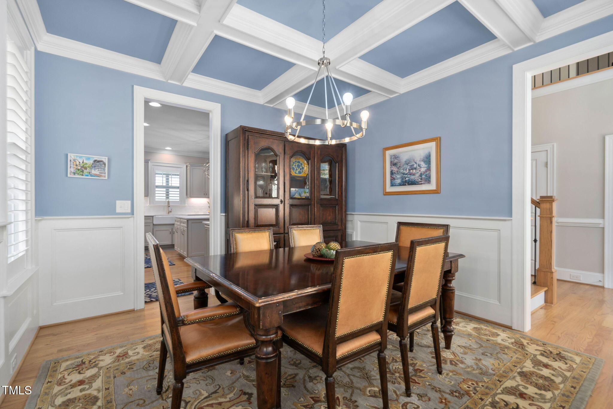 2461 Stonehenge Park Drive Raleigh, NC 27613 - Photo 7 of 72 a dining room with furniture and chandelier kitchen view