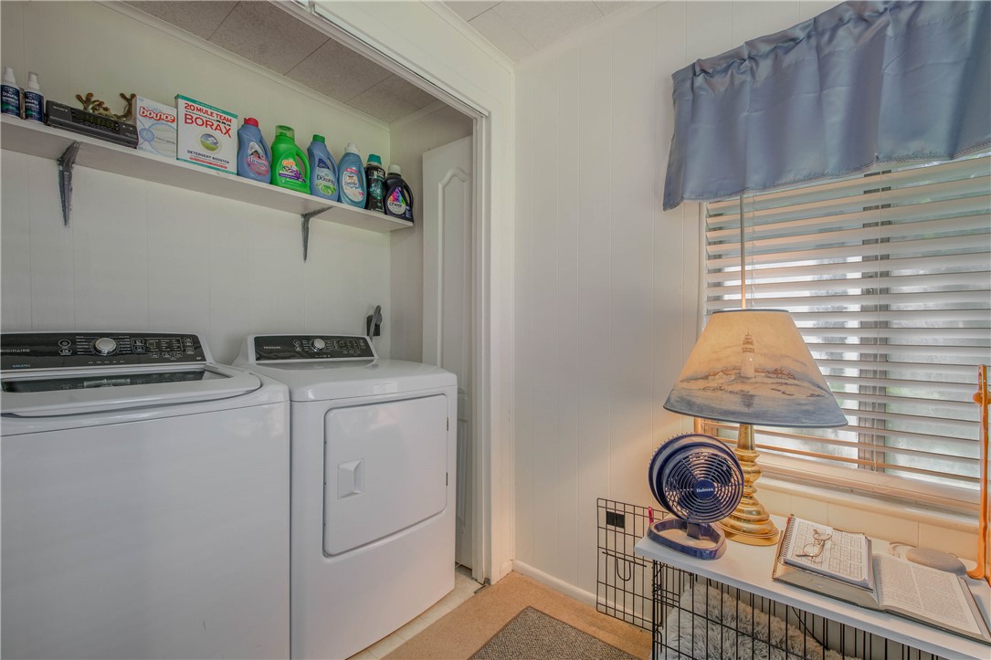 11001 Clyde Acord Road Franklin, TX 77856 - Photo 19 of 43 a utility room with dryer and washer