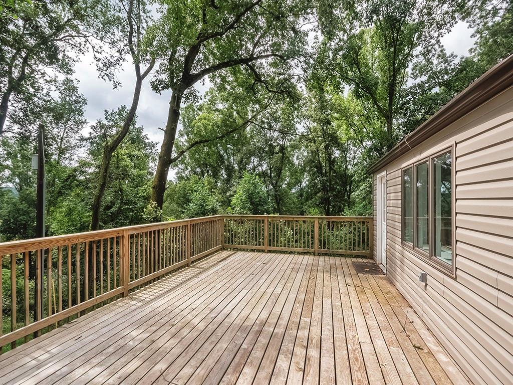 247 Rader School Road Renfrew, PA 16053 - Photo 18 of 28 a view of balcony with wooden floor and fence