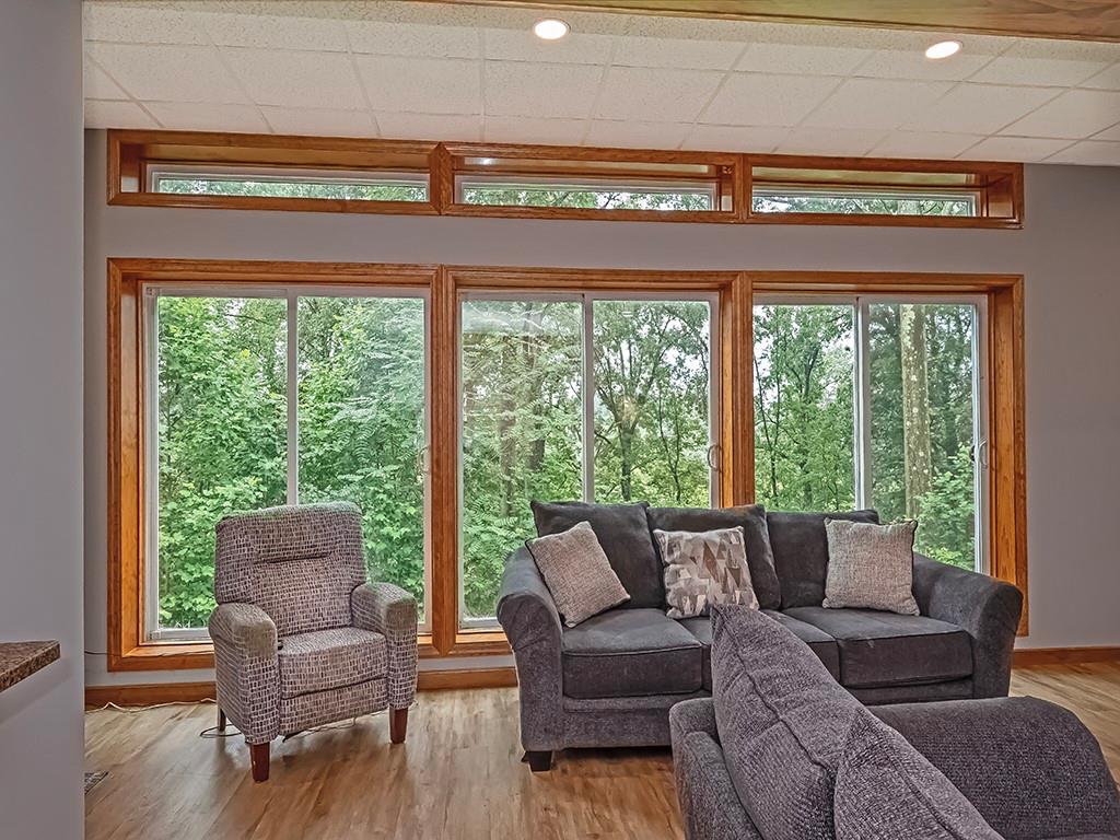 247 Rader School Road Renfrew, PA 16053 - Photo 5 of 28 a living room with furniture and a large window