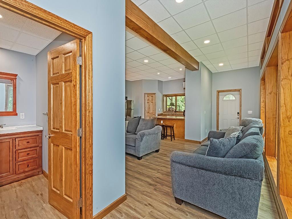 247 Rader School Road Renfrew, PA 16053 - Photo 6 of 28 a living room with furniture and a chandelier