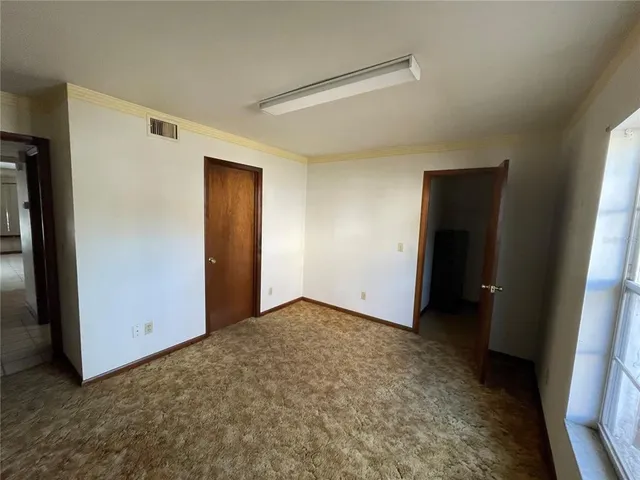 an empty room with closet