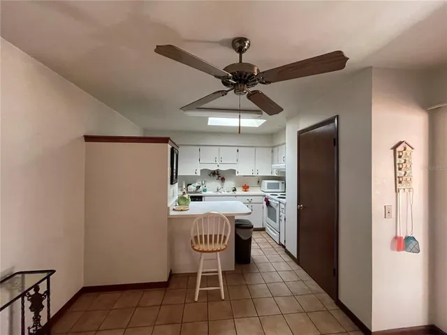 a kitchen with a refrigerator a sink and dishwasher