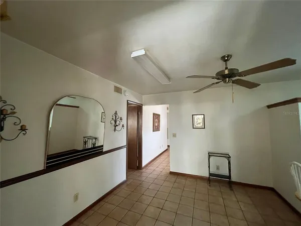 a view of a refrigerator in a room