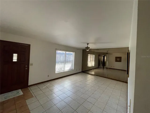 an empty room with windows