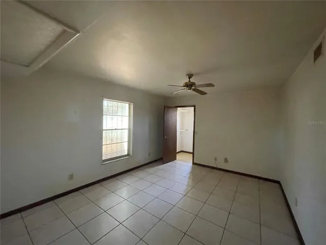 an empty room with windows