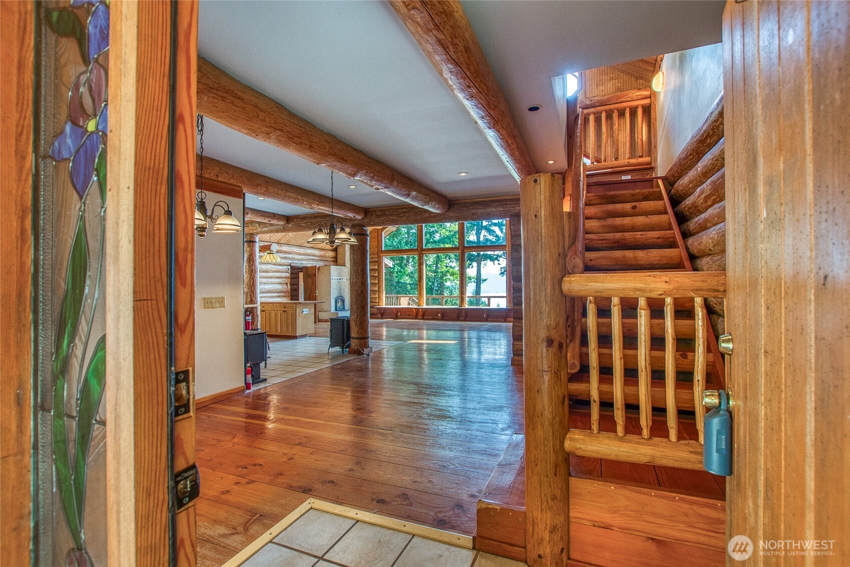 245 Roehl's Hill Road Orcas Island, WA 98279 - Photo 11 of 40 a view of front door with wooden floor and windows