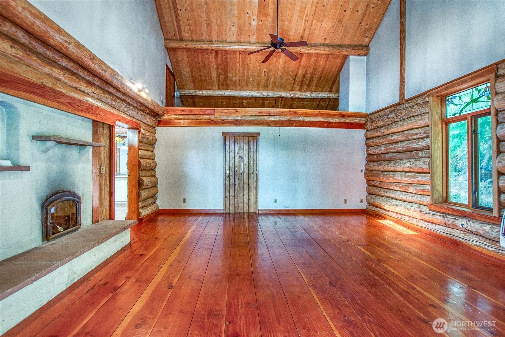 245 Roehl's Hill Road Orcas Island, WA 98279 - Photo 26 of 40 a view of a room with wooden floor