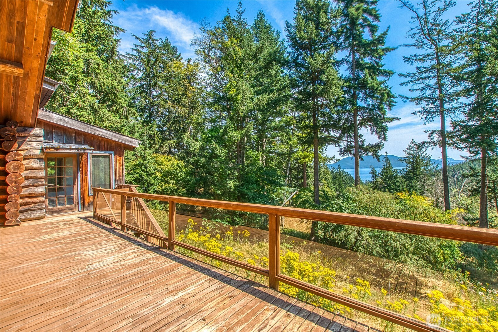 245 Roehl's Hill Road Orcas Island, WA 98279 - Photo 32 of 40 a view of balcony with wooden floor and fence