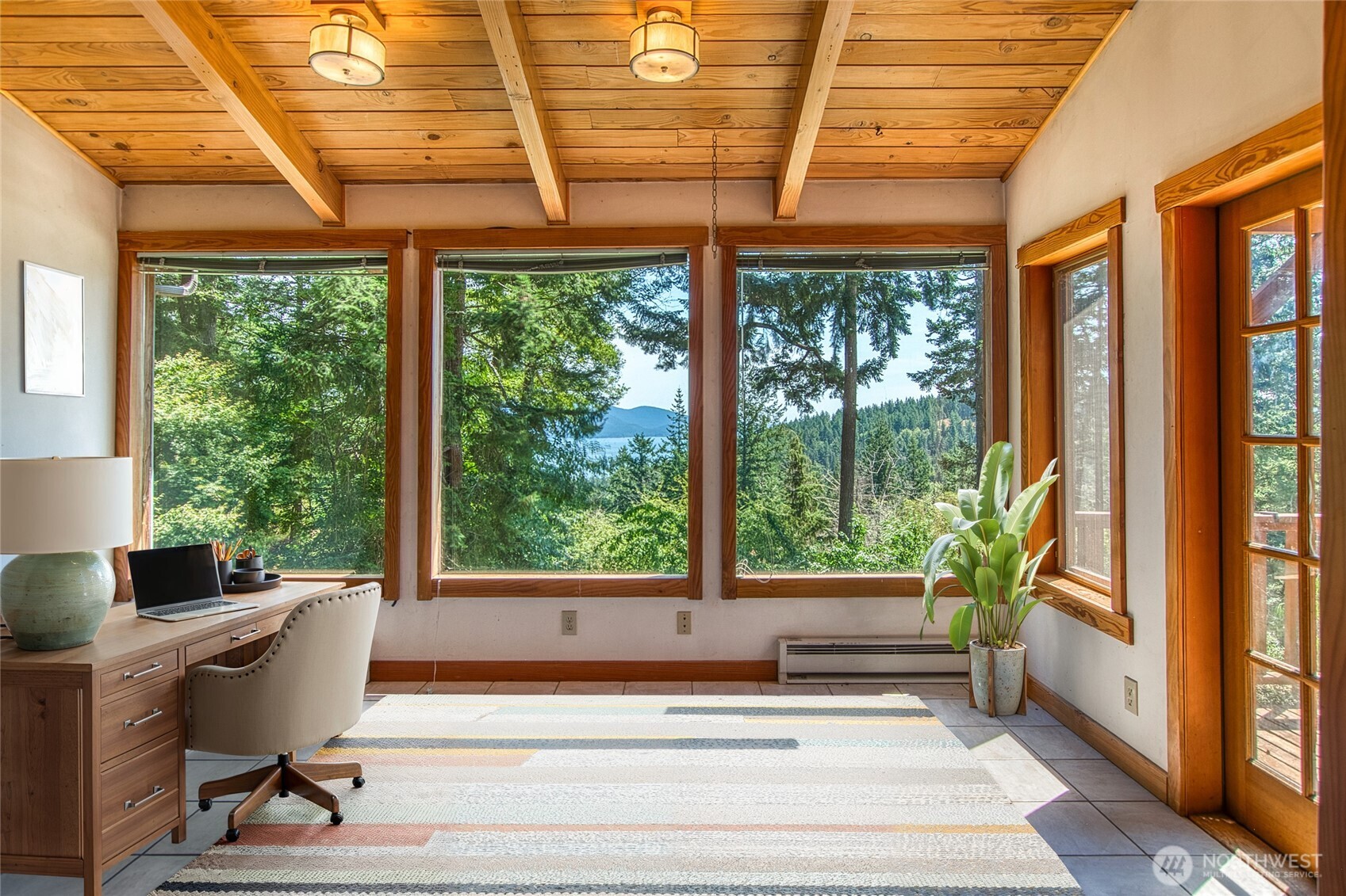 245 Roehl's Hill Road Orcas Island, WA 98279 - Photo 5 of 40 a living room filled with furniture and a window