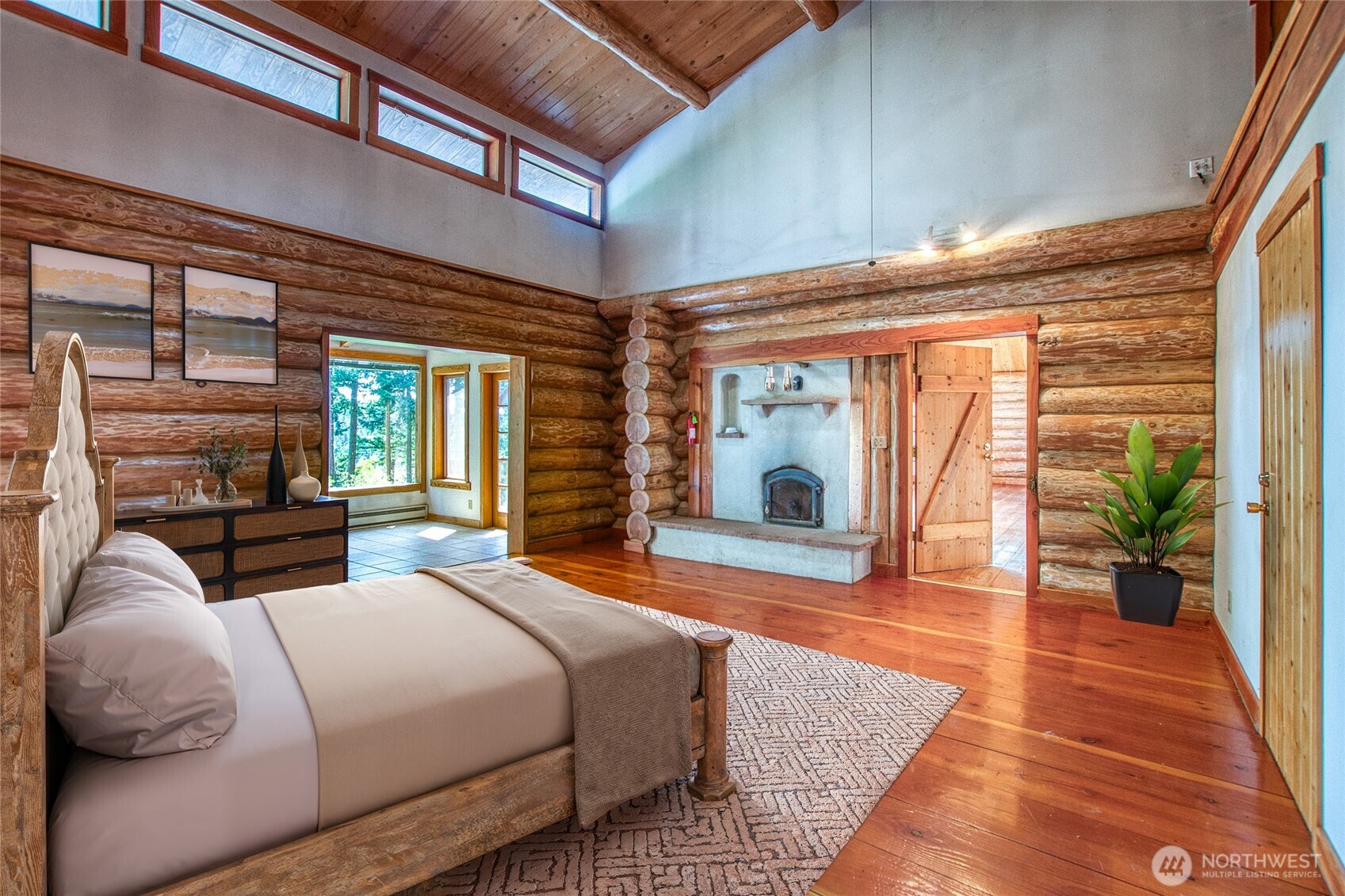 245 Roehl's Hill Road Orcas Island, WA 98279 - Photo 6 of 40 a bedroom with furniture and a large window