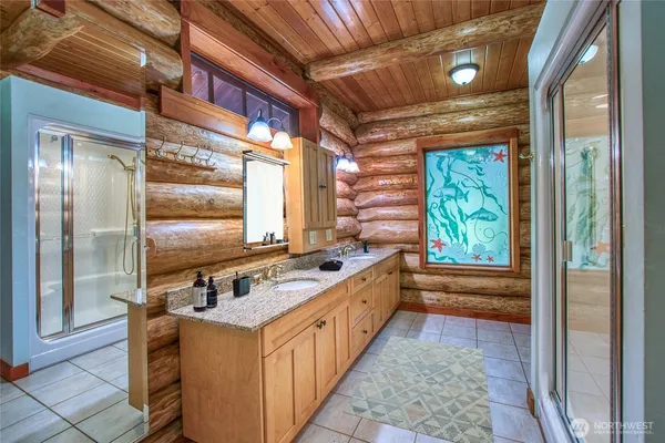 a kitchen with stainless steel appliances granite countertop a sink and a stove
