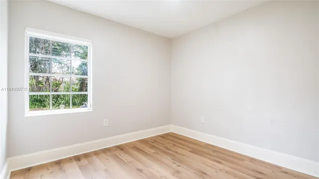 an empty room with a window