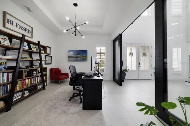 a living room with fireplace furniture and a flat screen tv