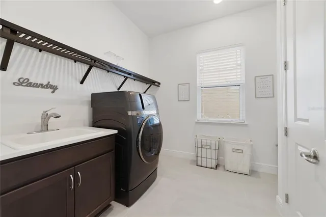 a bathroom with a sink toilet a mirror and shower
