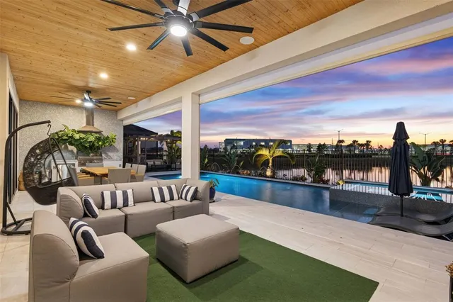 a view of a swimming pool with a porch