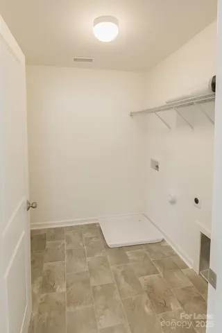 a view of a room with an empty space