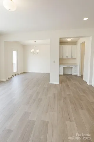 a view of staircase and utility room