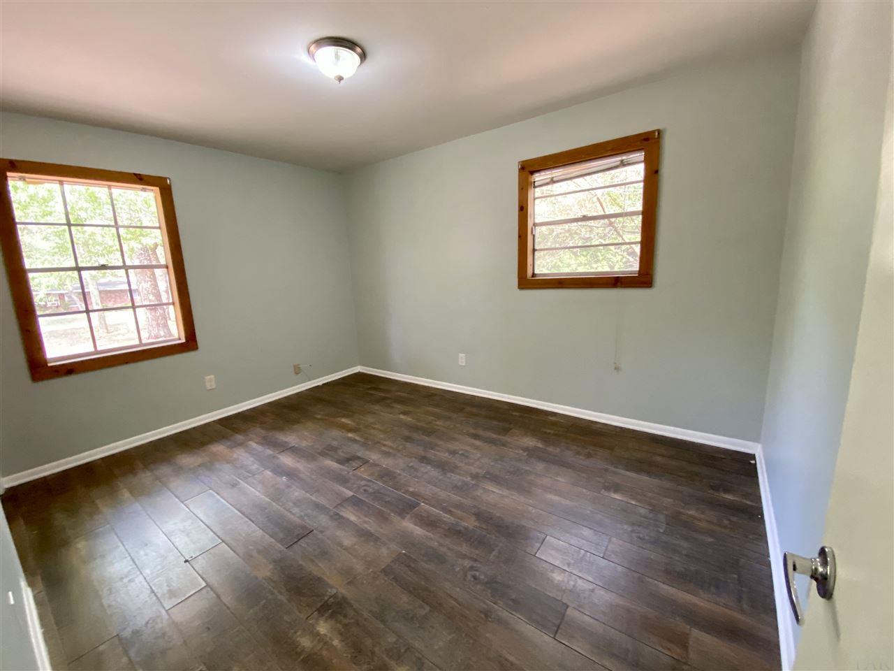 4861 Creighton Road Pensacola, FL 32504 - Photo 26 of 50 Located at end of hallway just left of master.