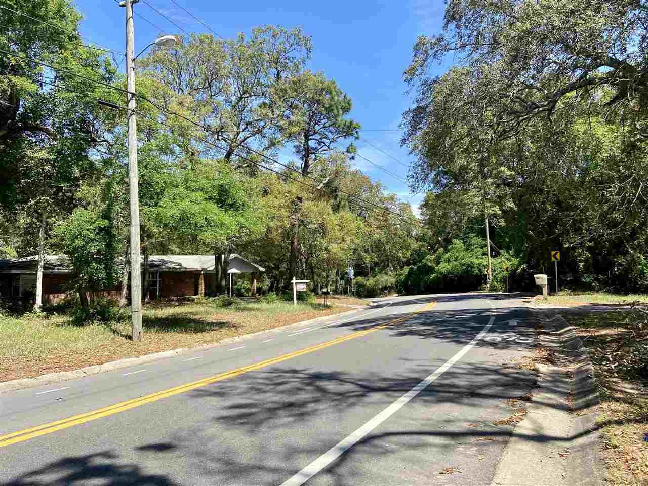4861 Creighton Road Pensacola, FL 32504 - Photo 3 of 50 Curve forces cars to go slower here.