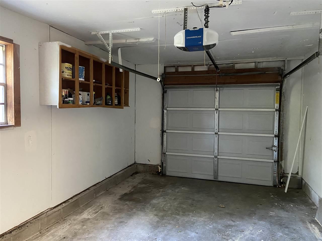 4861 Creighton Road Pensacola, FL 32504 - Photo 34 of 50 Newer garage opener and has shelving